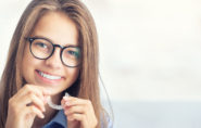 Young girl smiling with her Invisalign invisible braces